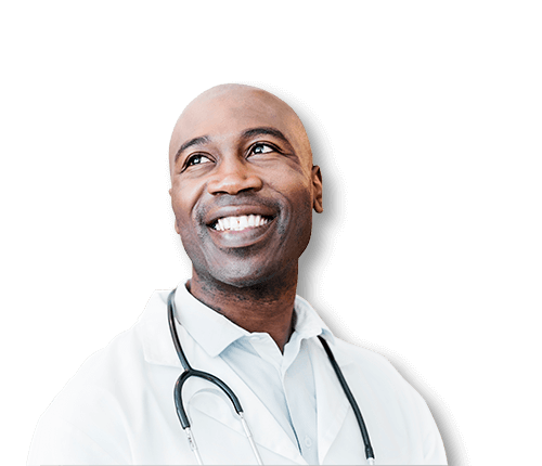 Smiling provider in white coat with black stethoscope